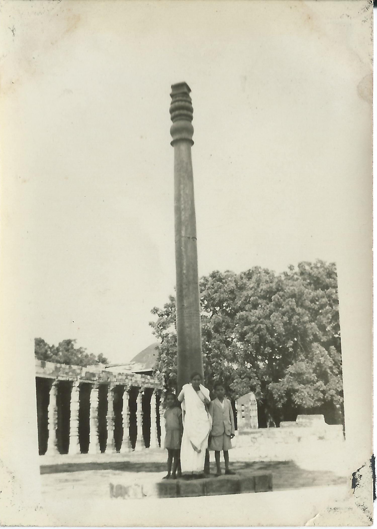 Children at the Iron Pillar in Qutub Complex